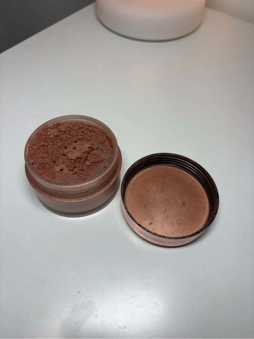 laura mercier opened but